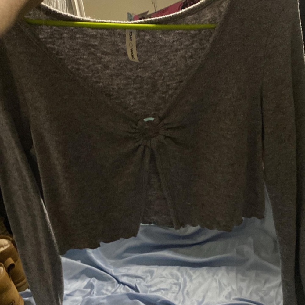 very cute long sleeve top with middle opening ..